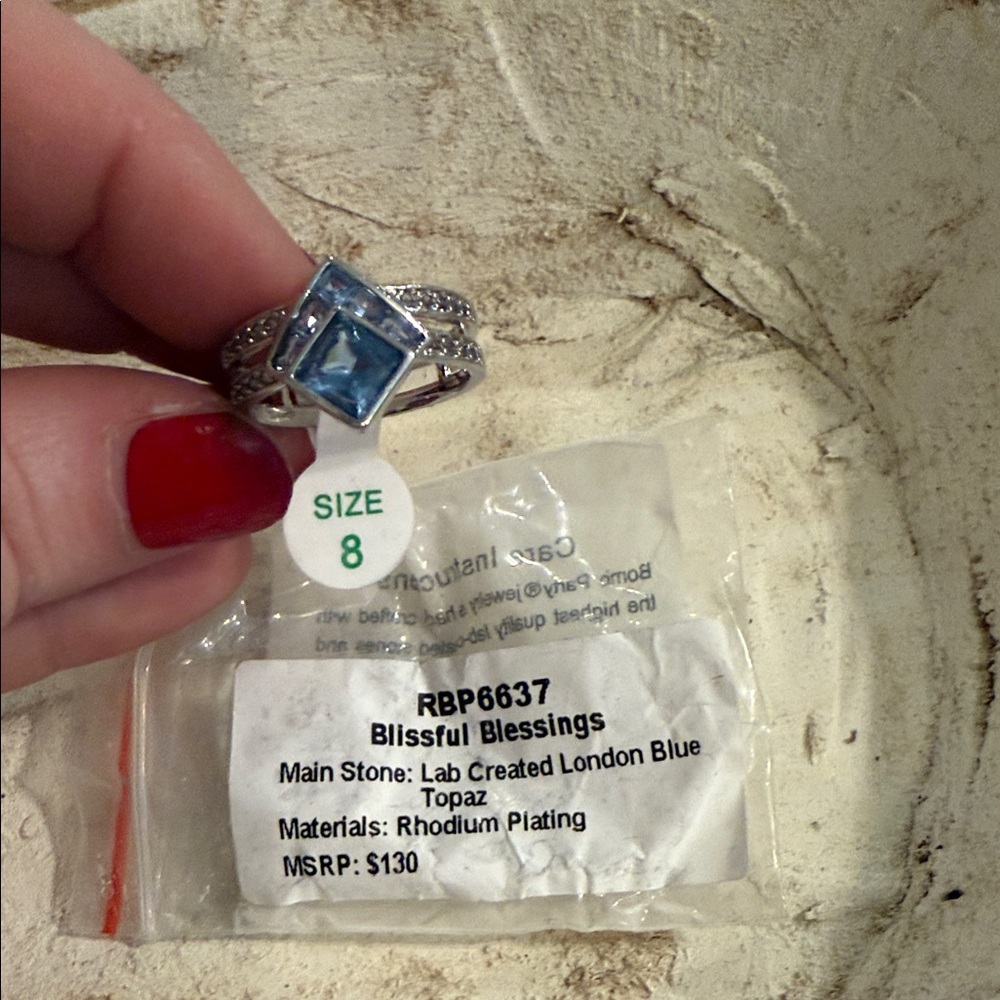 Blissful Blessings Silver and Blue Topaz Ring